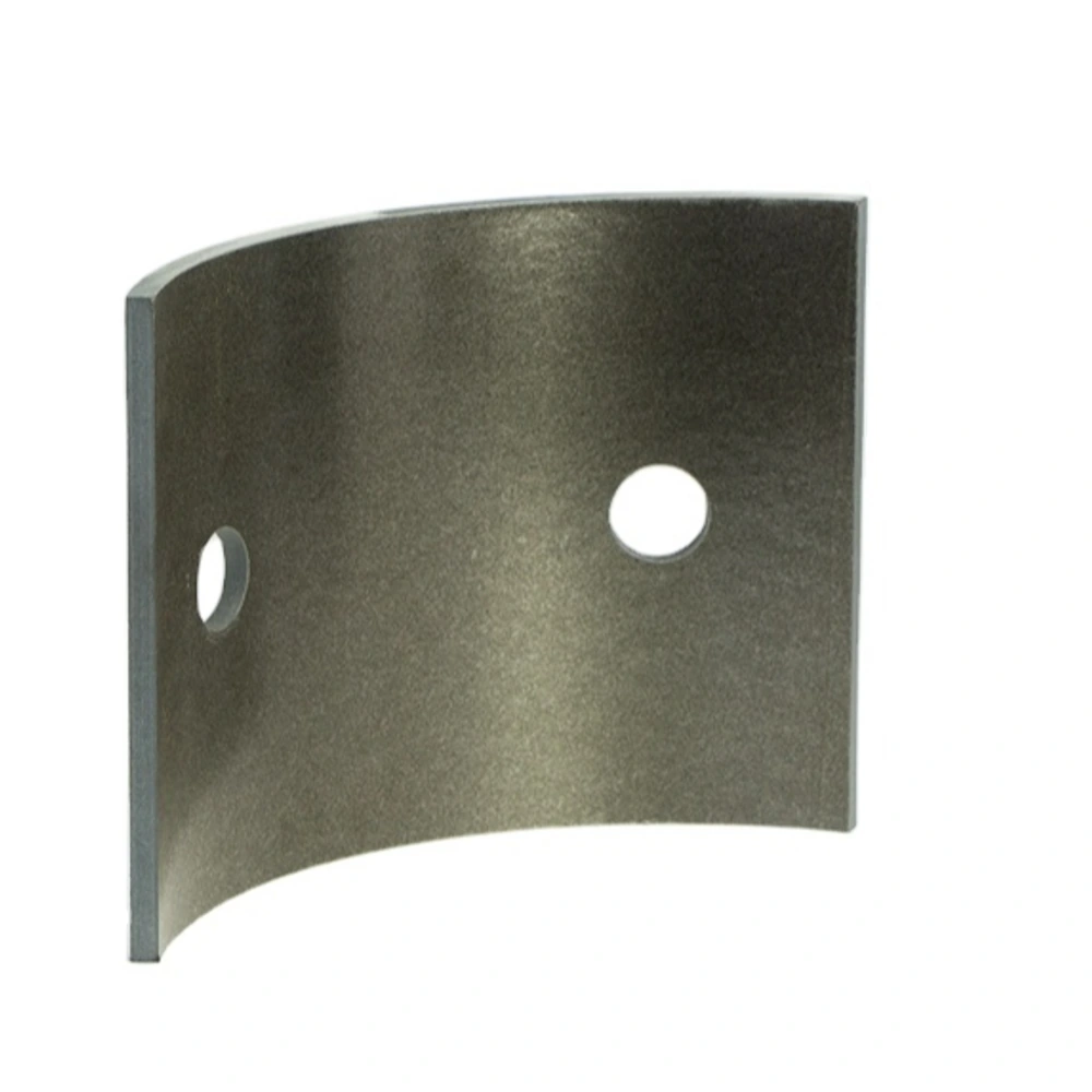 Curved mica insulation component with drilled openings