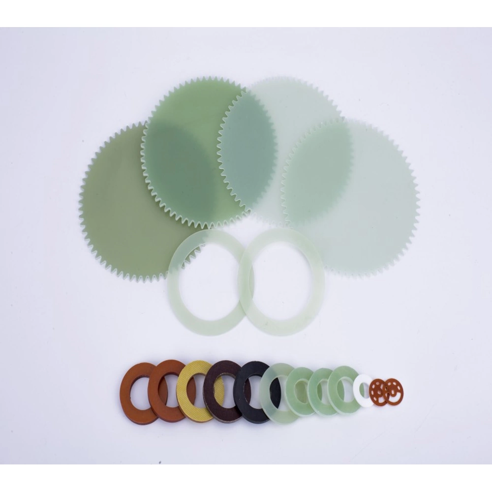 Machined laminate profiles and rings shown in a supplier reference photograph; not Normanson production